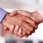 Entrepreneurs should be aware of exits when entering into contracts. Handshake photo courtesy of Flickr user buddawiggi.