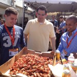 Jason Nicosia of Connect for a Cause, Barrett Conrad of Red Ticket Games, and Chapman Snowden of Kinobi oversee the crawfish spread at SXSW.